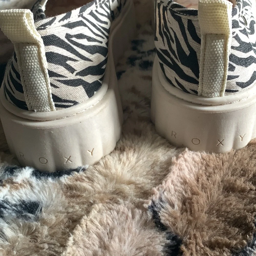 Roxy Zebra Print Platform Slip-On Sneakers in Black and Cream
